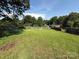 Expansive backyard with lush green grass, enclosed by a wooden fence, perfect for outdoor activities at 1445 33Rd Sw St, Hickory, NC 28602