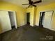 A view of the bedroom highlighting the closet space and ceiling fan at 1445 33Rd Sw St, Hickory, NC 28602