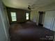 Bedroom featuring two windows, carpet, and closet at 1445 33Rd Sw St, Hickory, NC 28602