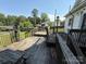 Spacious wooden deck offering an outdoor area to relax or entertain, with views of the backyard at 1445 33Rd Sw St, Hickory, NC 28602