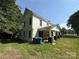 Two-story home with white siding and a covered front porch at 1445 33Rd Sw St, Hickory, NC 28602