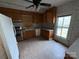 Kitchen with tile floors, wood cabinets and stainless steel appliances at 1445 33Rd Sw St, Hickory, NC 28602