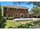 Brick house featuring a spacious backyard with a large deck and well-maintained lawn at 147 35Th Ne Ave, Hickory, NC 28601