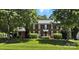 Traditional brick home featuring black shutters, manicured landscaping, and a lush front lawn at 147 35Th Ne Ave, Hickory, NC 28601