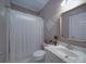 Cozy bathroom featuring a shower and vanity, with soft lighting at 1508 Avalon Oaks Ct, Dallas, NC 28034