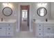 Well lit dual sink bathroom with views of the bedroom at 1508 Avalon Oaks Ct, Dallas, NC 28034