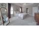 Bright, airy bedroom showcases soft carpet, and a comfortable, inviting atmosphere at 1508 Avalon Oaks Ct, Dallas, NC 28034