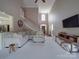 Spacious living room boasts high ceilings and large windows for great natural light at 1508 Avalon Oaks Ct, Dallas, NC 28034