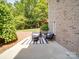Outdoor patio with brick, garden view, and an inviting seating area, ideal for entertaining guests at 1508 Avalon Oaks Ct, Dallas, NC 28034