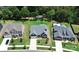 Aerial view of a modern home with a pool, backyard, and well-maintained landscaping at 163 Crenshaw Nw Pl, Concord, NC 28027