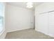 Comfortable bedroom with large closets, carpeting, and neutral paint colors at 163 Crenshaw Nw Pl, Concord, NC 28027