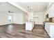 Spacious kitchen features an island, stainless steel appliances, and ample counter space at 163 Crenshaw Nw Pl, Concord, NC 28027