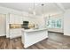 Bright kitchen with modern stainless steel appliances and updated countertops at 163 Crenshaw Nw Pl, Concord, NC 28027