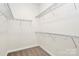 Walk-in closet with wire shelving for ample storage, perfect for organization at 163 Crenshaw Nw Pl, Concord, NC 28027