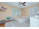 Sunny bedroom with a playful theme, comfortable bed, and ample storage space perfect for a room at 1715 Wensley Dr, Charlotte, NC 28210