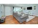 Bright living room with large windows, hardwood floors and neutral decor at 1715 Wensley Dr, Charlotte, NC 28210