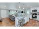 Open living space features combined kitchen and living room with hardwood floors at 1715 Wensley Dr, Charlotte, NC 28210
