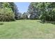 Spacious backyard with plenty of room for gardening and other outdoor activities at 173 Rocky River Rd, Mooresville, NC 28115
