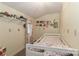 Cozy bedroom with bright walls, carpet, and a twin size bed with built-in storage at 173 Rocky River Rd, Mooresville, NC 28115
