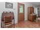 Cozy entryway featuring a hardwood floor and antique furniture at 173 Rocky River Rd, Mooresville, NC 28115