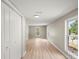Bright bedroom with wood-look floors and large windows, providing lots of natural light at 1746 2Nd Street Sw Pl, Hickory, NC 28602