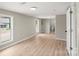 Bright bedroom with wood-look flooring and two windows providing natural light at 1746 2Nd Street Sw Pl, Hickory, NC 28602