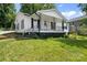 Lovely single-Gathering home with a welcoming front porch and a lush green lawn at 1746 2Nd Street Sw Pl, Hickory, NC 28602