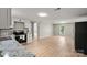 Stylish kitchen featuring modern appliances, granite countertops, and new flooring at 1746 2Nd Street Sw Pl, Hickory, NC 28602