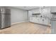 Spacious kitchen with stainless steel refrigerator and white cabinets with marble countertops at 1746 2Nd Street Sw Pl, Hickory, NC 28602