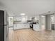 Bright kitchen with white cabinets, granite countertops, and stainless steel appliances and sink at 1746 2Nd Street Sw Pl, Hickory, NC 28602