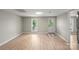 Bright living room boasts new floors, fresh paint, and a door leading to the backyard at 1746 2Nd Street Sw Pl, Hickory, NC 28602