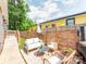 Charming backyard featuring a patio, outdoor seating, and lush greenery, perfect for relaxation at 1817 Rush Wind Dr, Charlotte, NC 28206