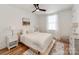 Bright bedroom with hardwood floors and lots of natural light from a large window at 1817 Rush Wind Dr, Charlotte, NC 28206