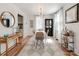 Charming dining room with natural light, stylish furniture, and seamless access to the kitchen area at 1817 Rush Wind Dr, Charlotte, NC 28206