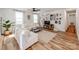 Bright and airy living room featuring hardwood floors, comfortable white furniture, and stylish decor at 1817 Rush Wind Dr, Charlotte, NC 28206