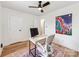 Study with hardwood floors, a stylish area rug, and a modern computer desk at 1817 Rush Wind Dr, Charlotte, NC 28206