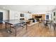 Entertaining game room with ping pong table, seating area, and open layout at 19946 River Falls Dr, Davidson, NC 28036