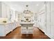 Gourmet kitchen with marble countertops, a kitchen island, and stainless steel appliances at 19946 River Falls Dr, Davidson, NC 28036