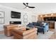 Cozy living room features a modern fireplace, comfortable seating, and open concept layout at 19946 River Falls Dr, Davidson, NC 28036