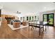 Spacious living area with hardwood floors, modern furnishings, and ample natural light at 19946 River Falls Dr, Davidson, NC 28036