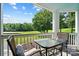 Relaxing patio with outdoor seating and picturesque views of the golf course at 19946 River Falls Dr, Davidson, NC 28036