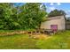 The backyard includes a shed and landscaping at 211 Ridgecrest St, Kannapolis, NC 28081