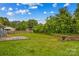 View of the backyard featuring the lawn and landscaping at 211 Ridgecrest St, Kannapolis, NC 28081