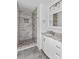 Stylish bathroom featuring modern shower, elegant sink, and white vanity for a luxurious feel at 211 Ridgecrest St, Kannapolis, NC 28081