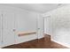 View of bedroom features stylish wallpaper and unique built-in shelf at 211 Ridgecrest St, Kannapolis, NC 28081