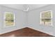 Bright, spacious bedroom with wood flooring and abundant natural light at 211 Ridgecrest St, Kannapolis, NC 28081