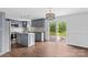 Updated kitchen with stainless steel appliances opens to backyard deck at 211 Ridgecrest St, Kannapolis, NC 28081
