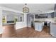 Open floor plan featuring a modern kitchen and cozy living room at 211 Ridgecrest St, Kannapolis, NC 28081