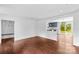 Open concept floor plan leads to kitchen and sliding glass door to exterior at 211 Ridgecrest St, Kannapolis, NC 28081
