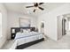 Serene bedroom with a comfortable bed, stylish décor, and a glimpse into an en-suite bathroom at 3748 Ellington St, Charlotte, NC 28211